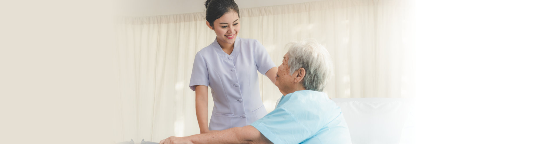 nurse in homecare helping senior patient
